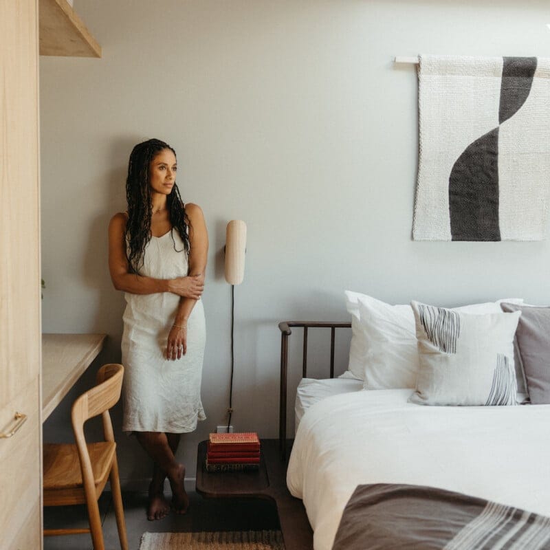 "Minimalist elegance meets cozy comfort in this serene bedroom retreat!"