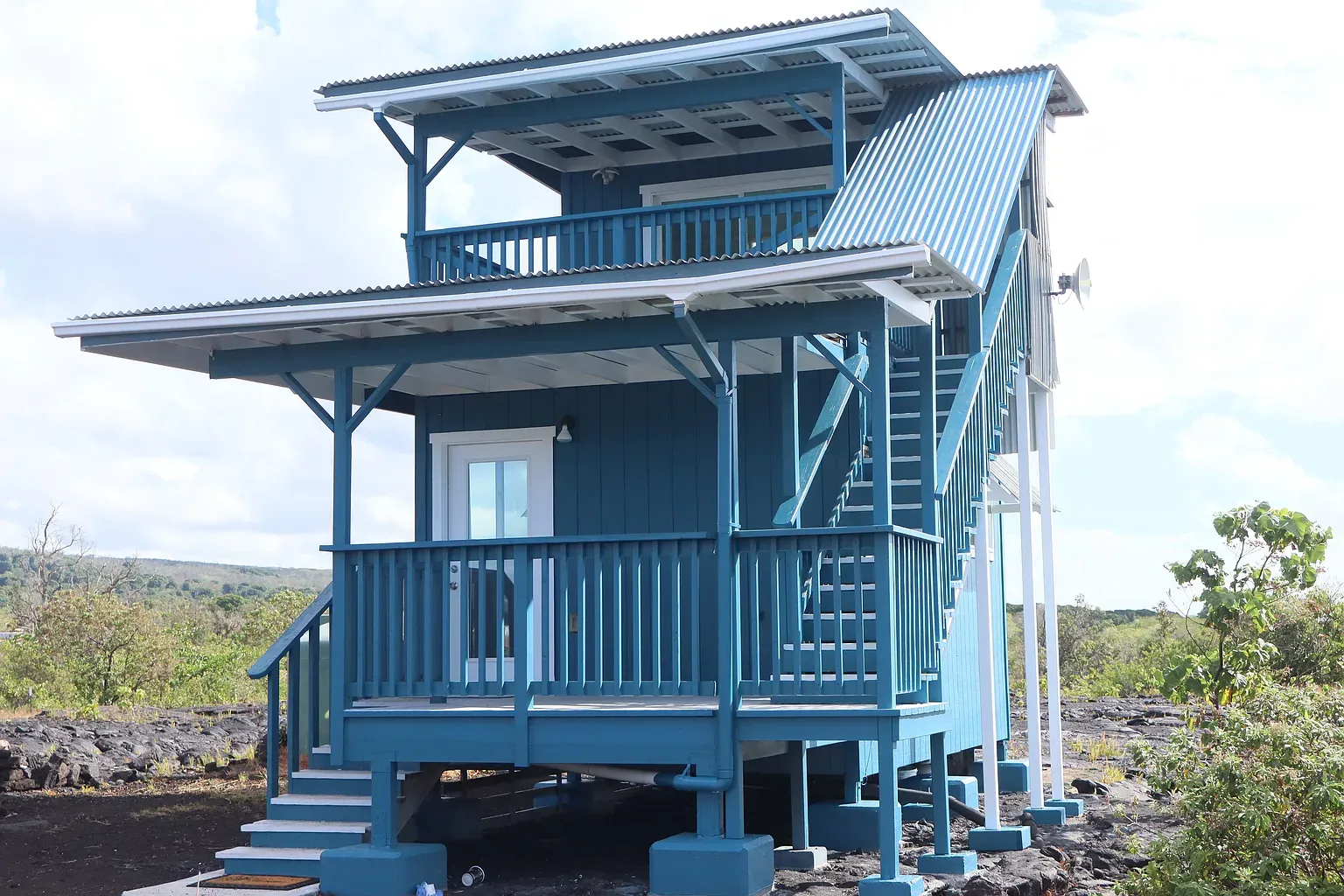 Here’s the exterior — bold blue with crisp white trim. Beach house vibes.