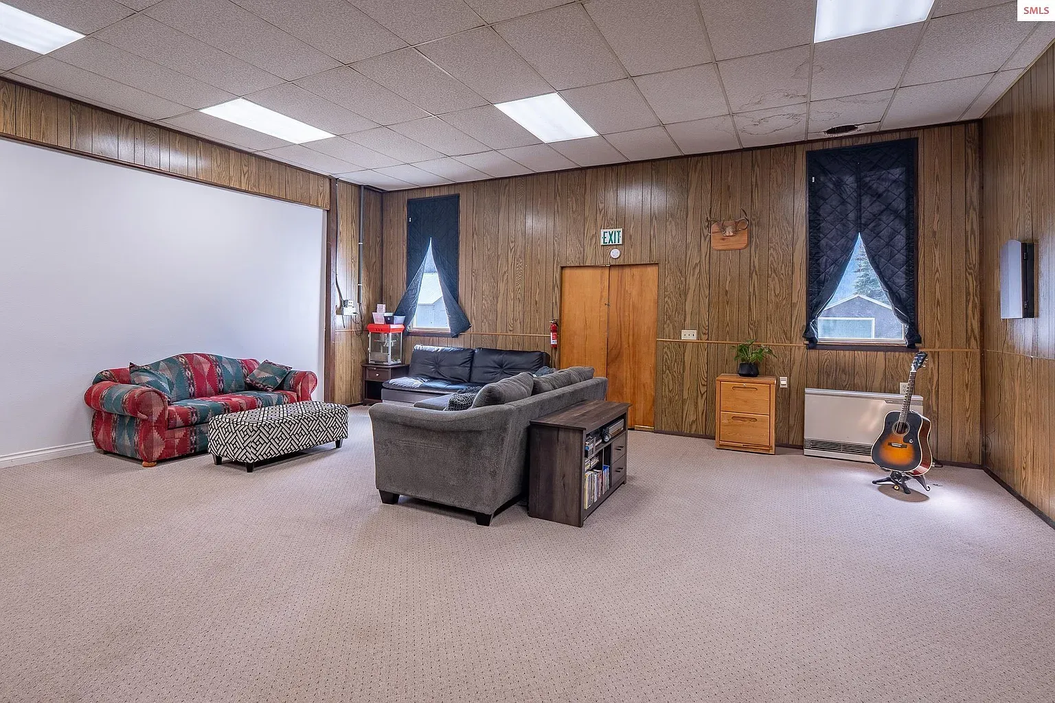Big paneled bonus room. I mean, cozy, but maybe too much?