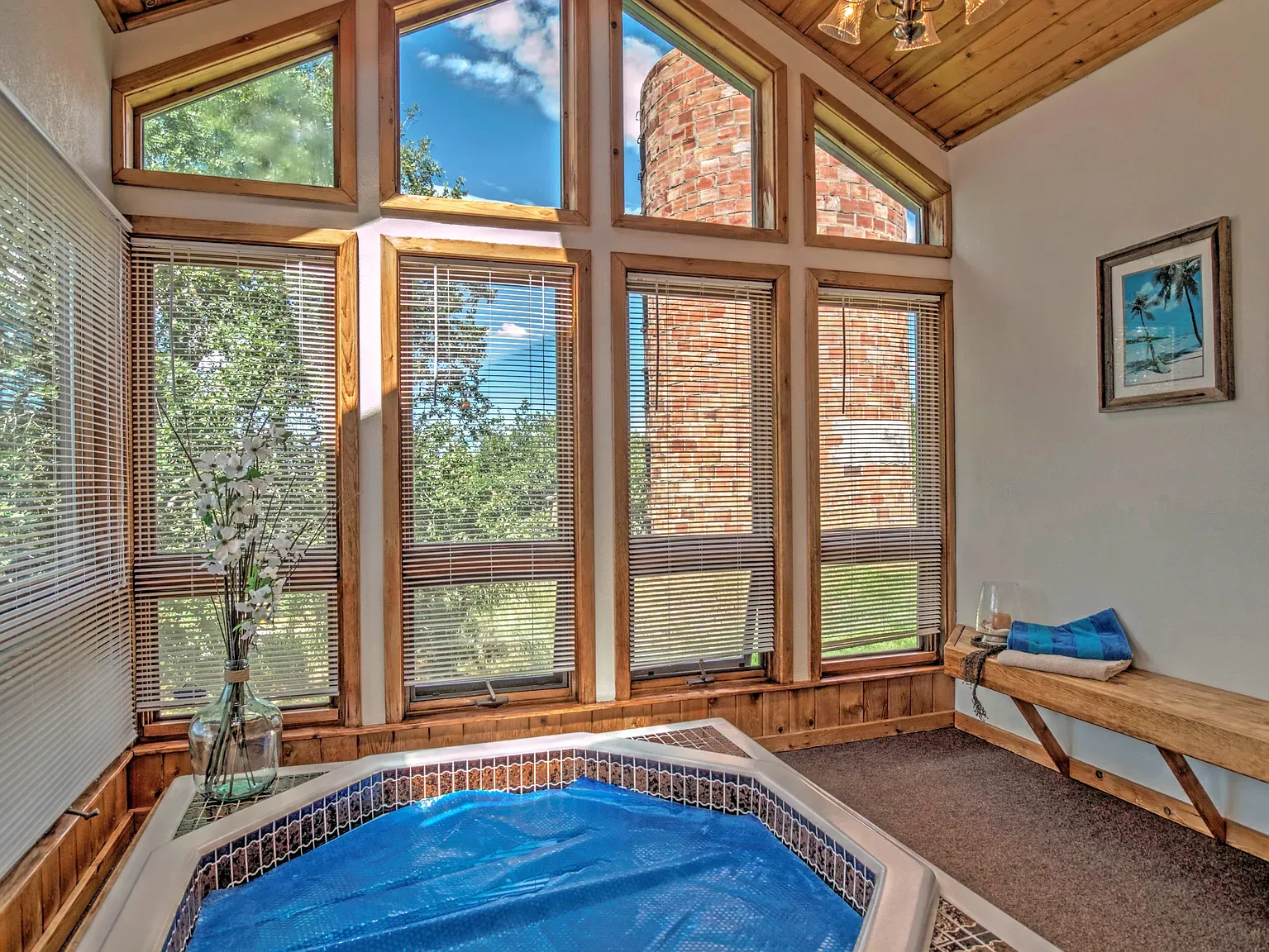 Okay, these triangle windows — wow, what a view. Wood ceiling nails it.