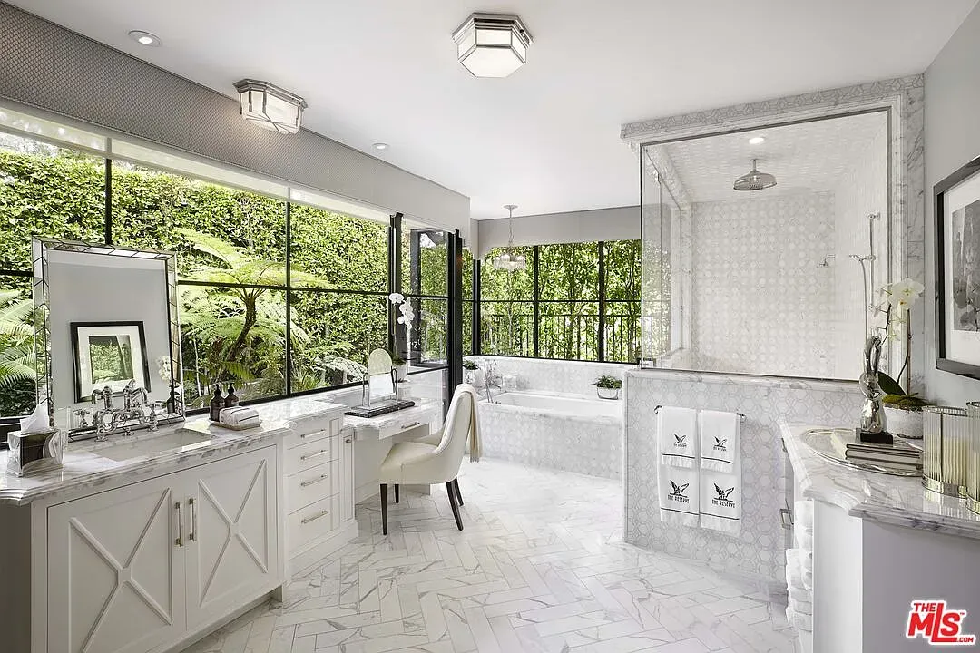 Switch to bright marble—herringbone floors, crisp fixtures. Spa energy.