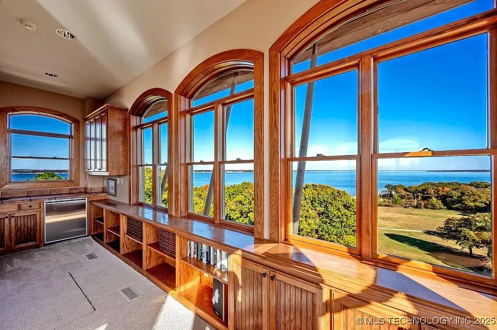 And then this wall of arches. Water views plus fancy cabinetry flex.