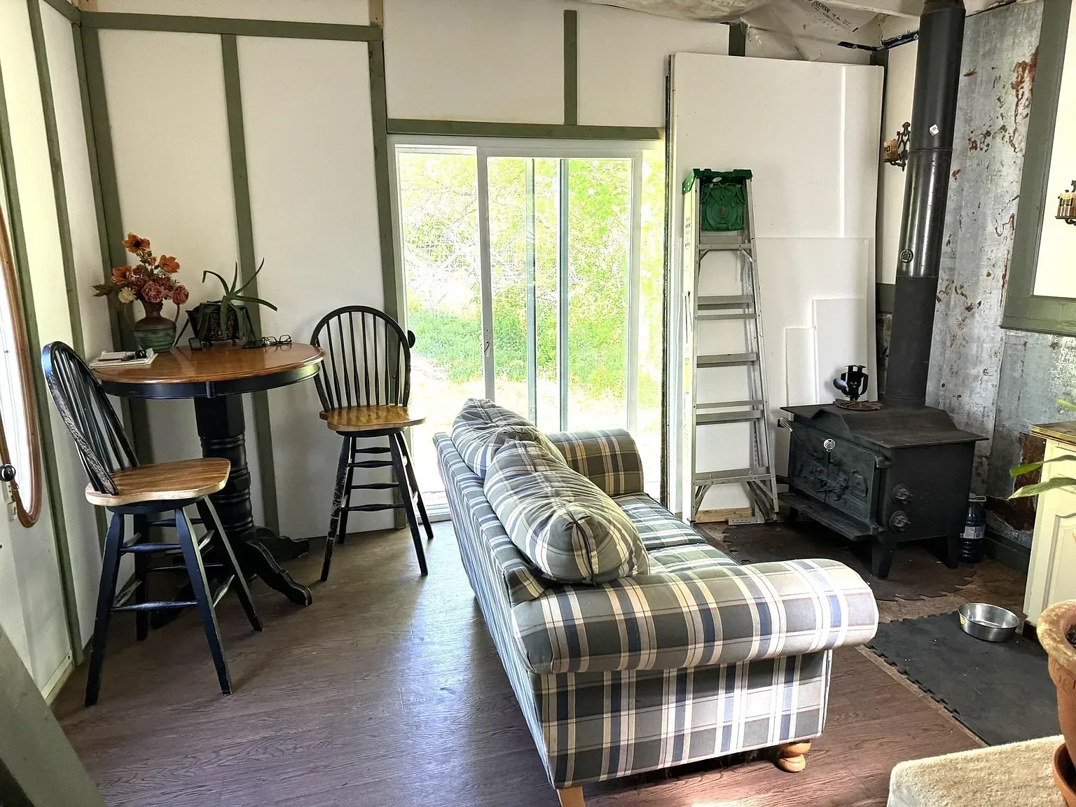 Muted earth tones everywhere. Soft textiles, simple chairs. Feels a weekend nap.