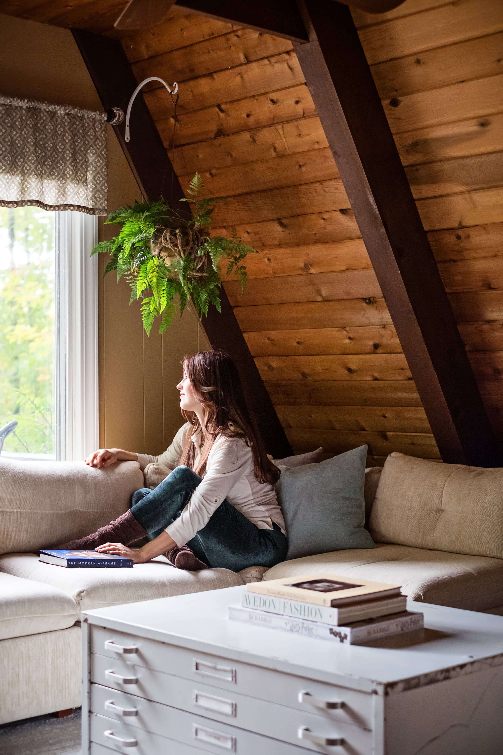 "Cozy A-frame retreat with warm wood and natural light"