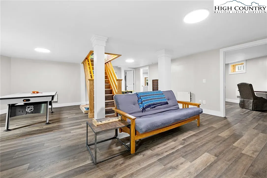 ## Not bad for a basement—wide planks, warm tones, and room to spread out.