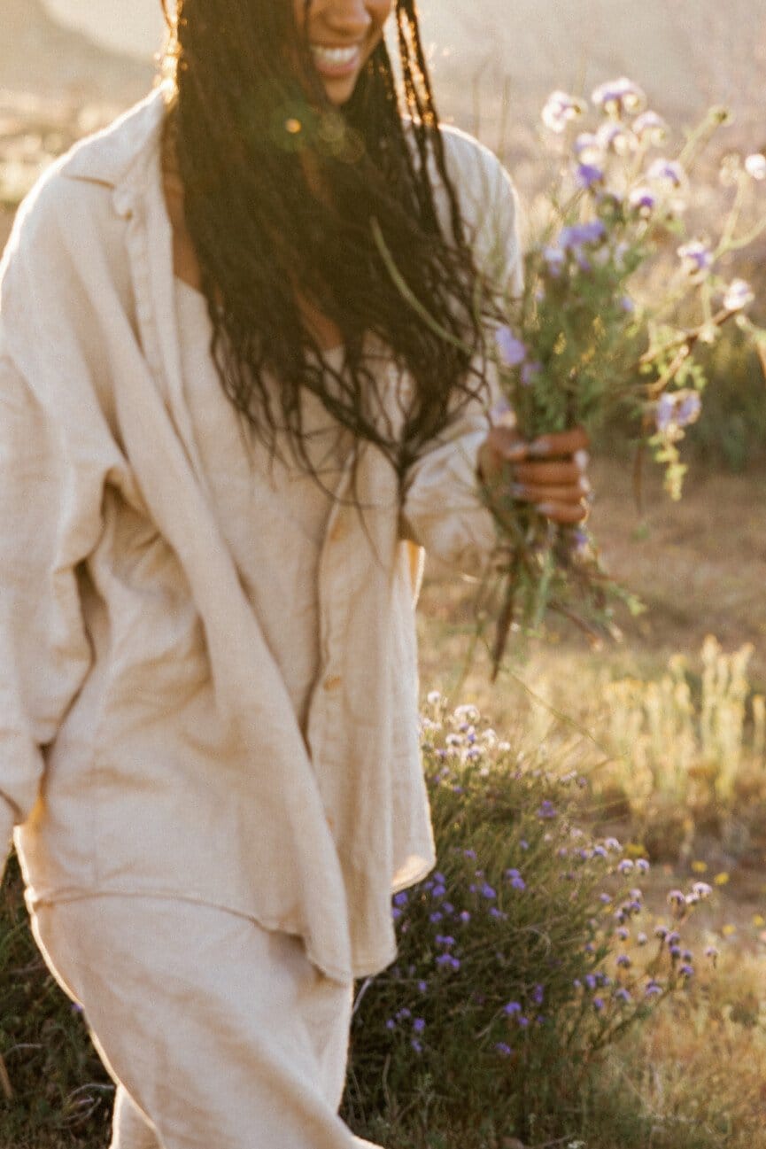 "Golden hour blooms with purple wildflowers in a dreamy meadow"