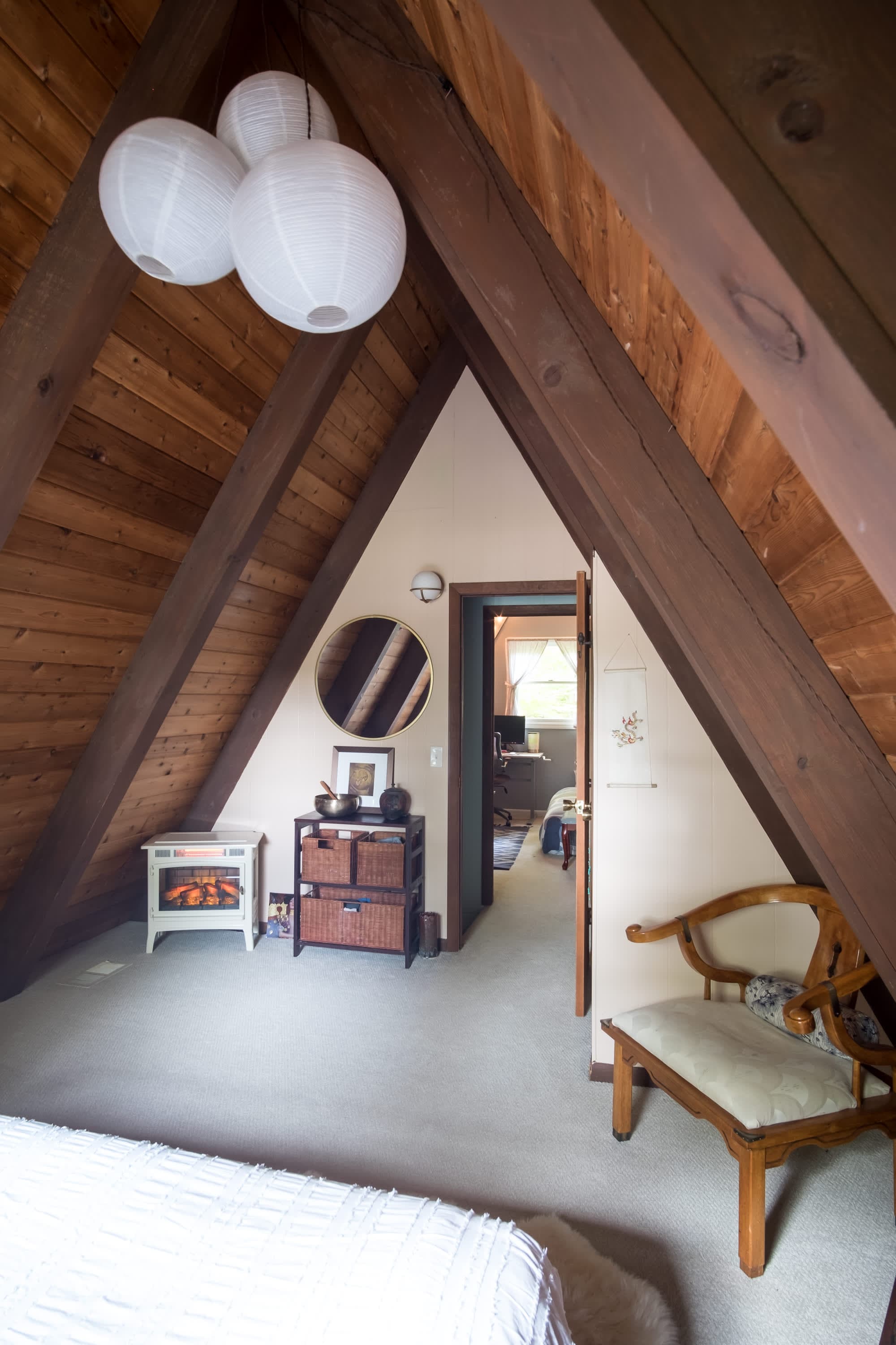 "Cozy A-frame retreat with rustic beams and modern charm!"