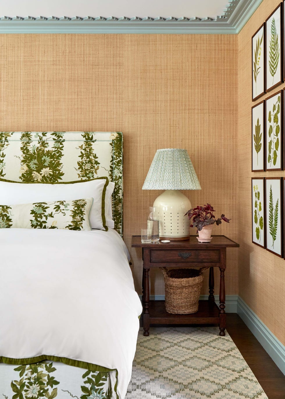 "Nature-Inspired Elegance: A Serene Bedroom Retreat with Botanical Accents and Warm Textured Walls!"