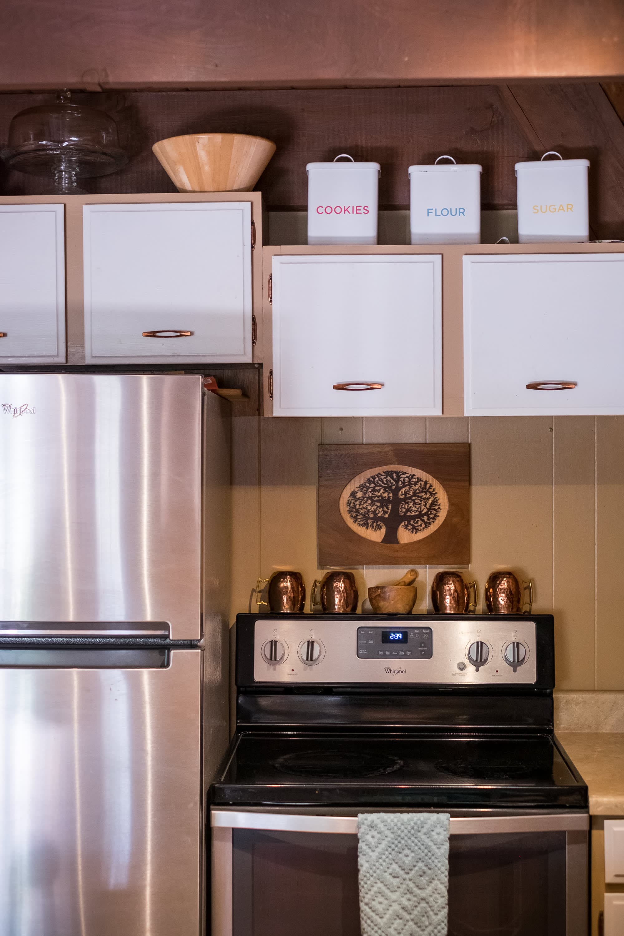 "Cozy kitchen with rustic charm and organized baking essentials!"