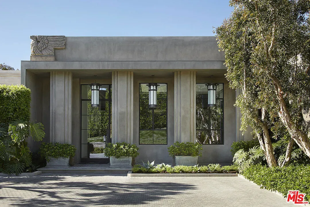 Final exterior. taupe concrete, tall columns. I mean, cool, maybe too much?