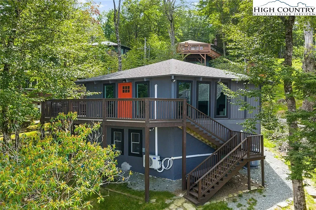 ## A bold modern façade nestles into the trees—quiet mountain vibes start right here.
