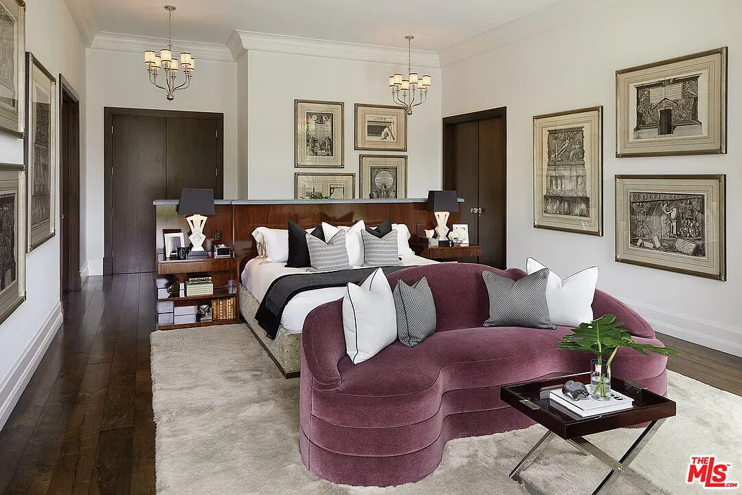 Here’s another bedroom. dark floors, tall headboard, soft lighting. Cozy-modern mix.