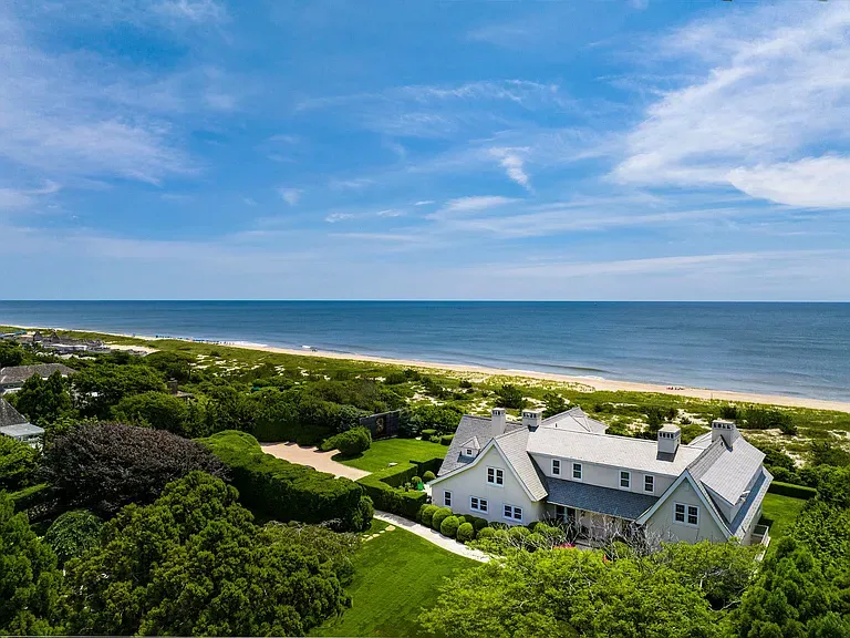 "Isn’t this view amazing? You can see the beach just a short stroll away, and the greenery around the house really makes it feel private and welcoming!"
