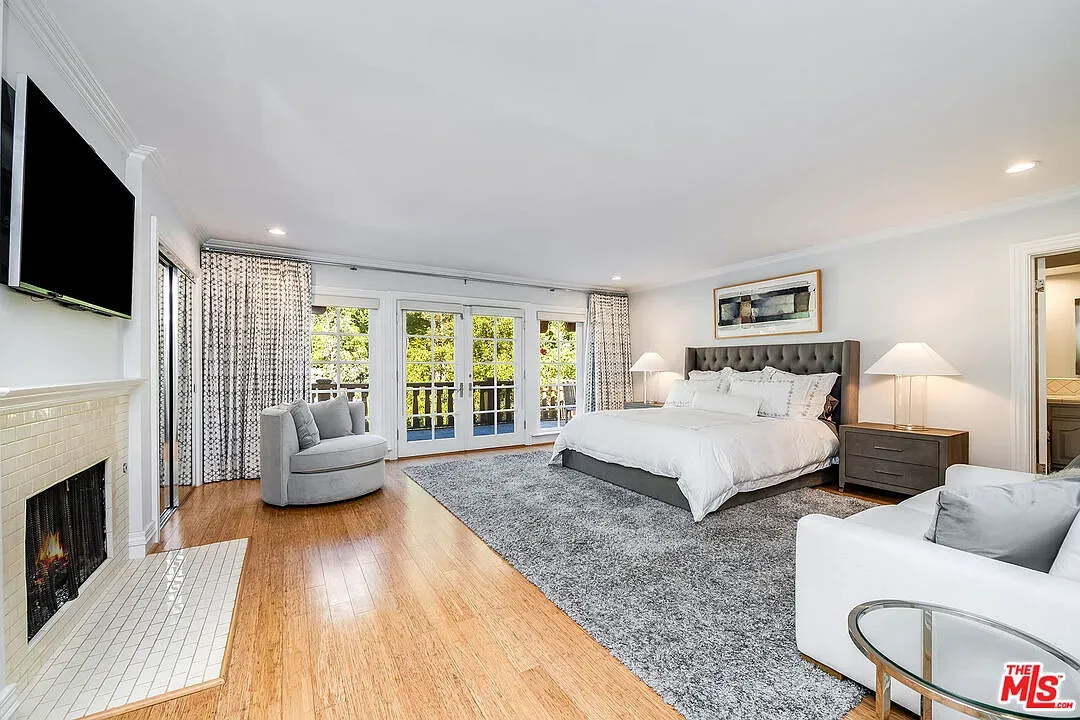 Bedroom goes hotel-soft. Whites, beiges, big bed begging for naps.