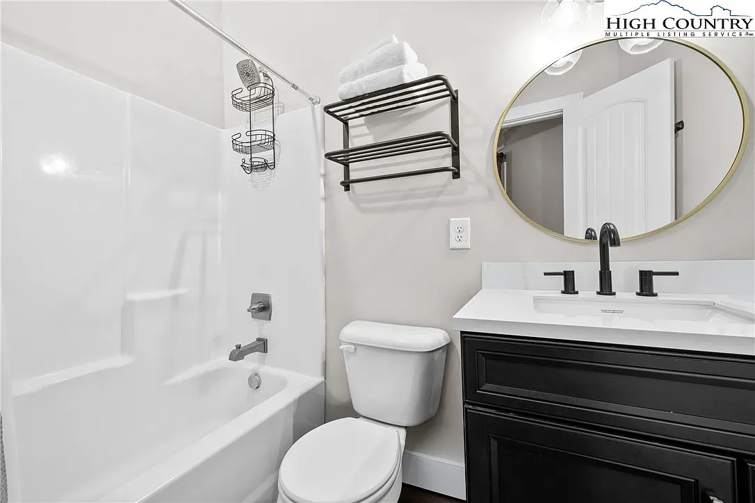 ## The bathroom stays simple and modern—soft neutrals, smart fixtures, and a relaxed vibe.