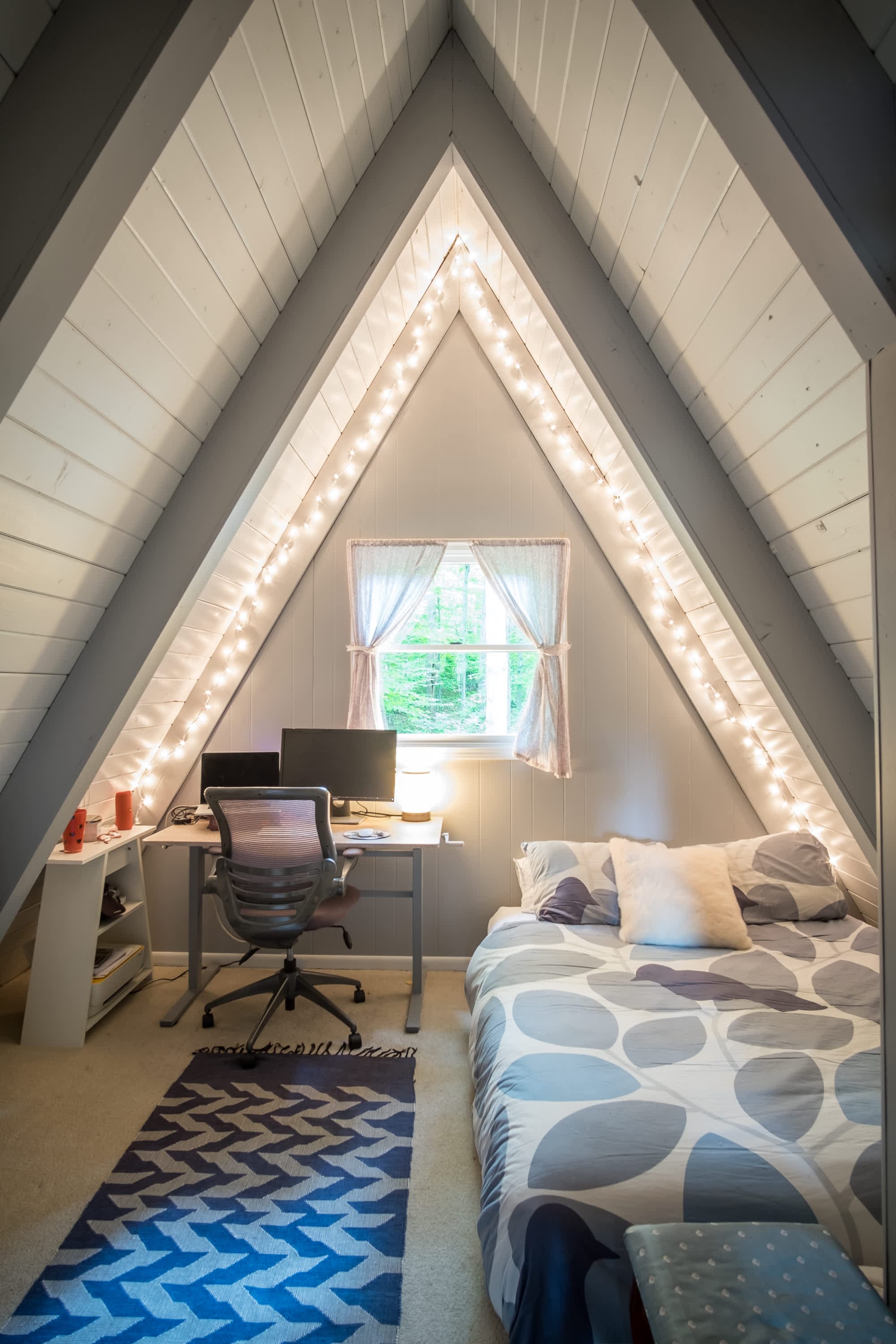 "Cozy A-frame attic transformed into dreamy WFH retreat!"