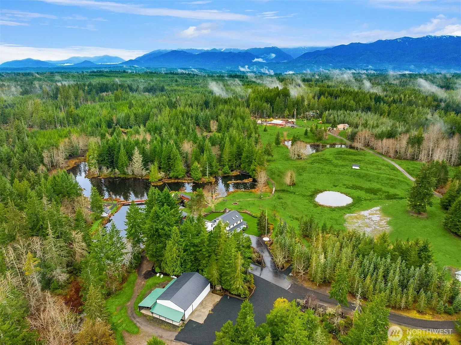 Aerial view — endless green, little structures, and yeah, the views.