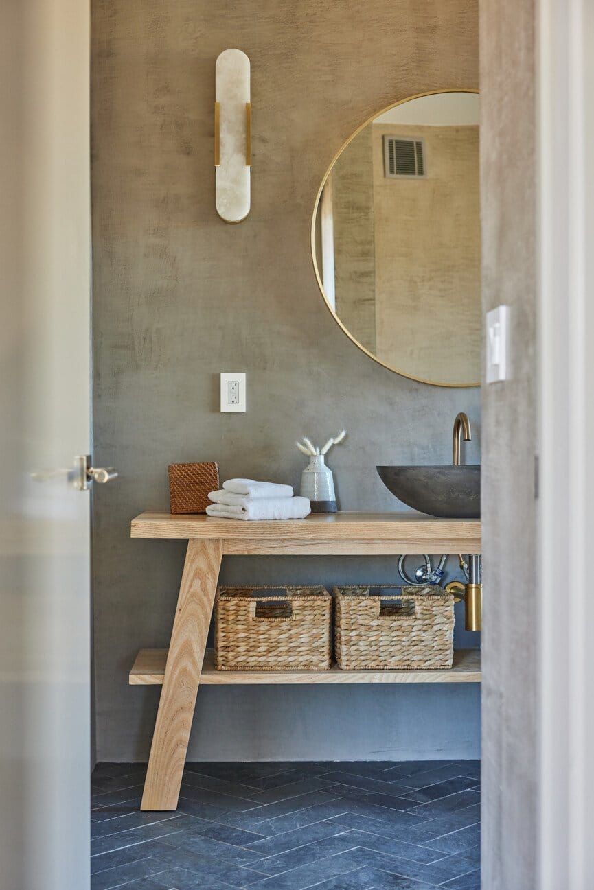 "Zen-inspired powder room with natural textures and elegant simplicity!"