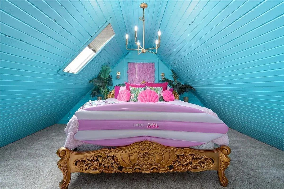 ## Turn the corner to turquoise beams and a baroque bed—this attic feels like a candy-colored daydream with real vintage flair.