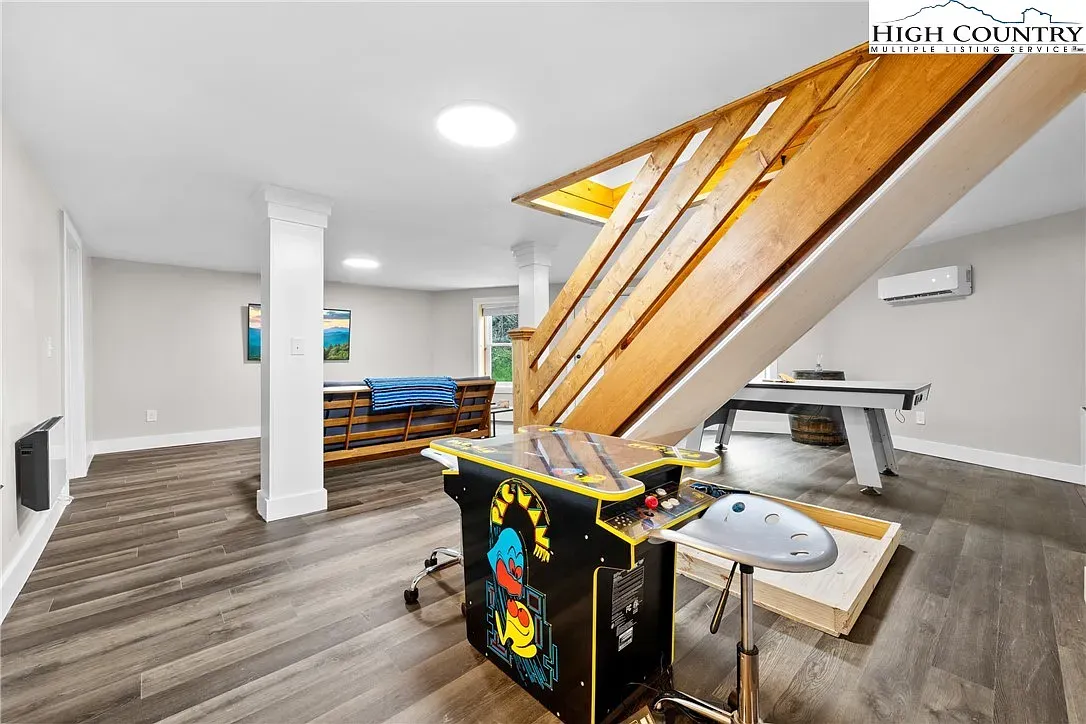 ## Next up, a flexible play-and-lounge room; dark wood floors ground the fun.