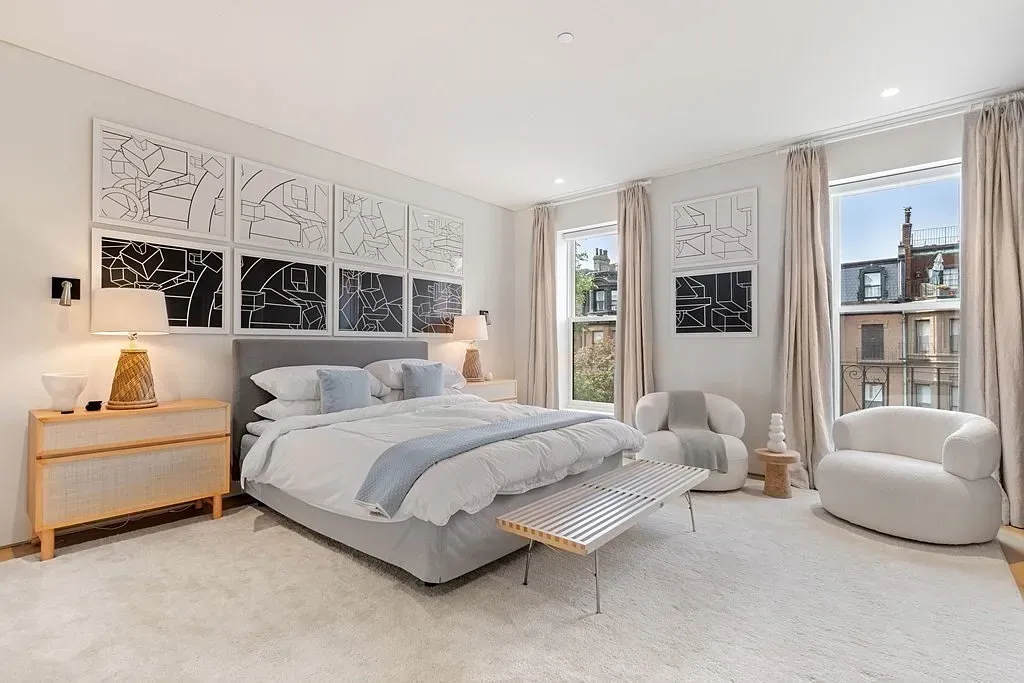 'This bedroom has a really nice calming vibe, with all that natural light coming in from the big windows!'