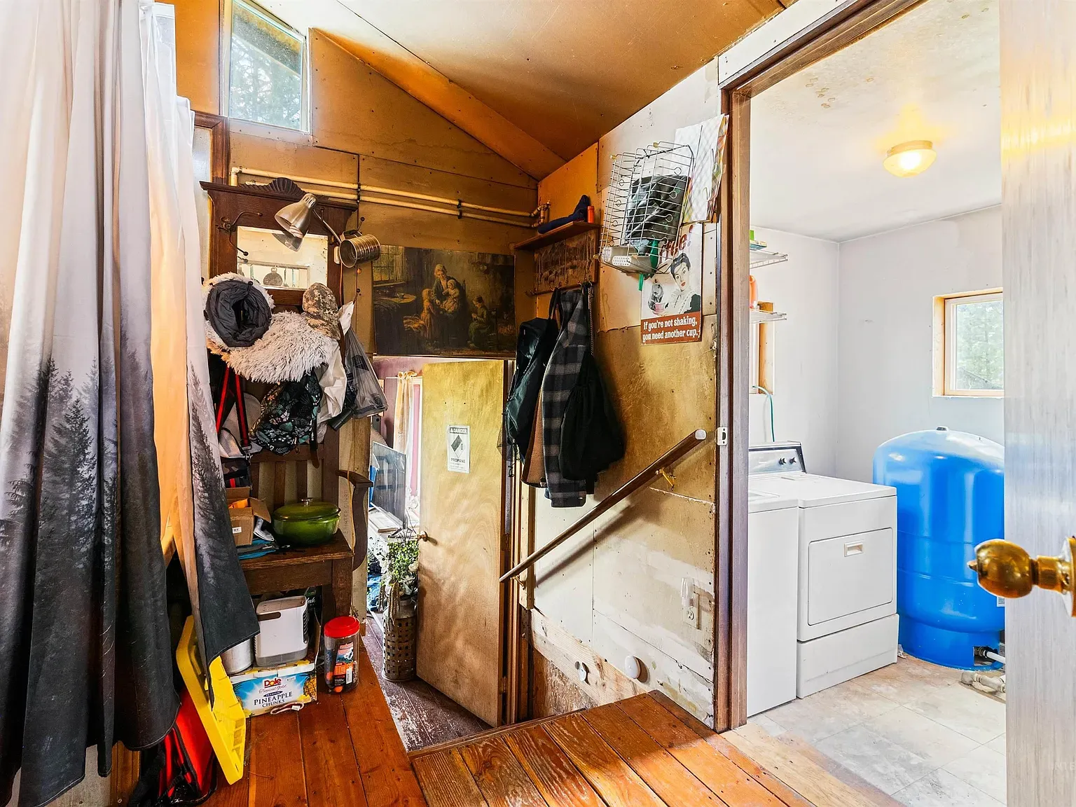 Wood steps and warm floors, bits of storage tucked around.