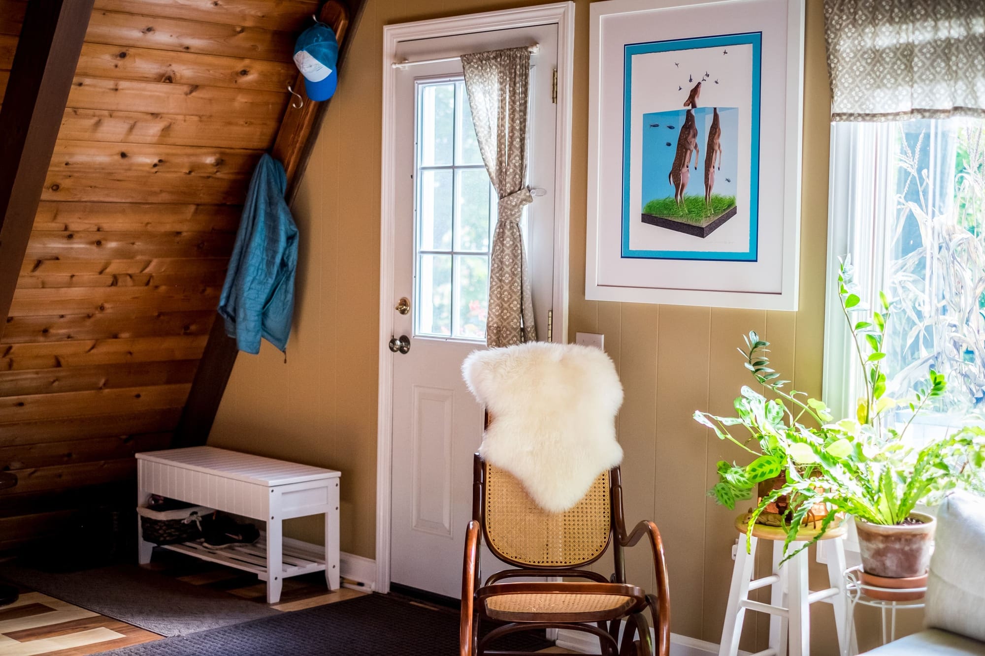 "Cozy cabin nook with artistic flair and natural light!"