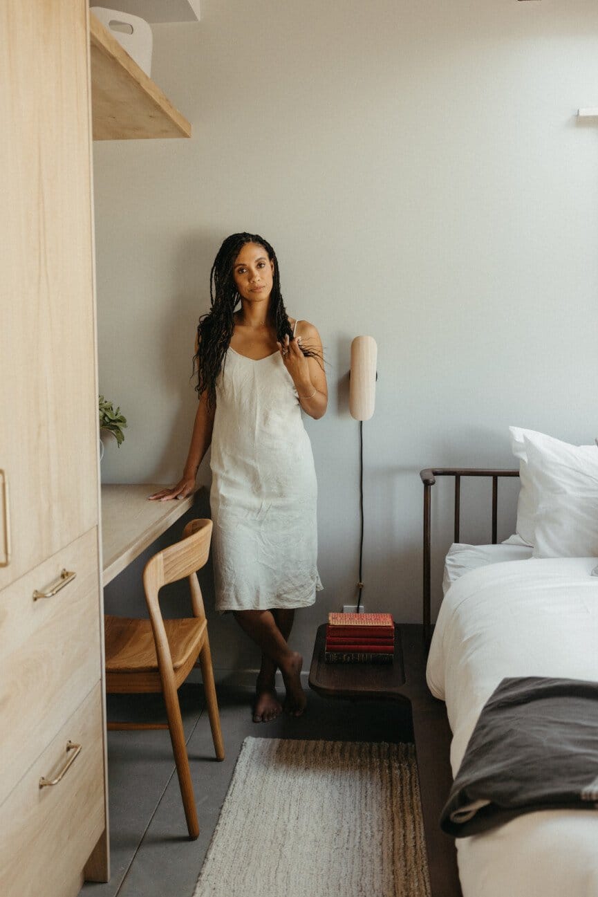"Minimalist Serenity: Where Light Linen Meets Warm Wood Tones"