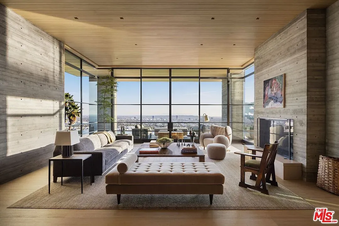 Living room goes full panorama. Skylines for days, minimal stuff stealing attention.