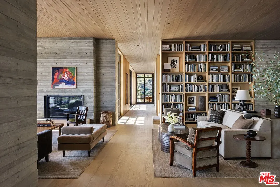 Light floors doing the most. Open layout actually feels warm, somehow.