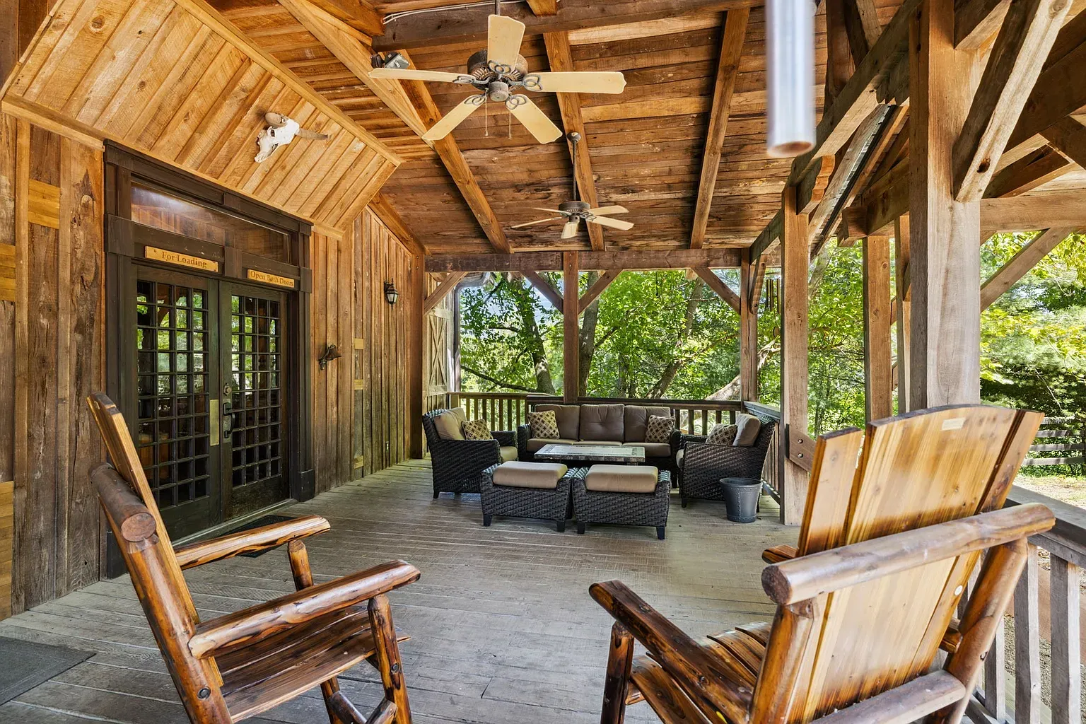Covered porch goals. All wood, wide open, perfect for a slow thunderstorm.