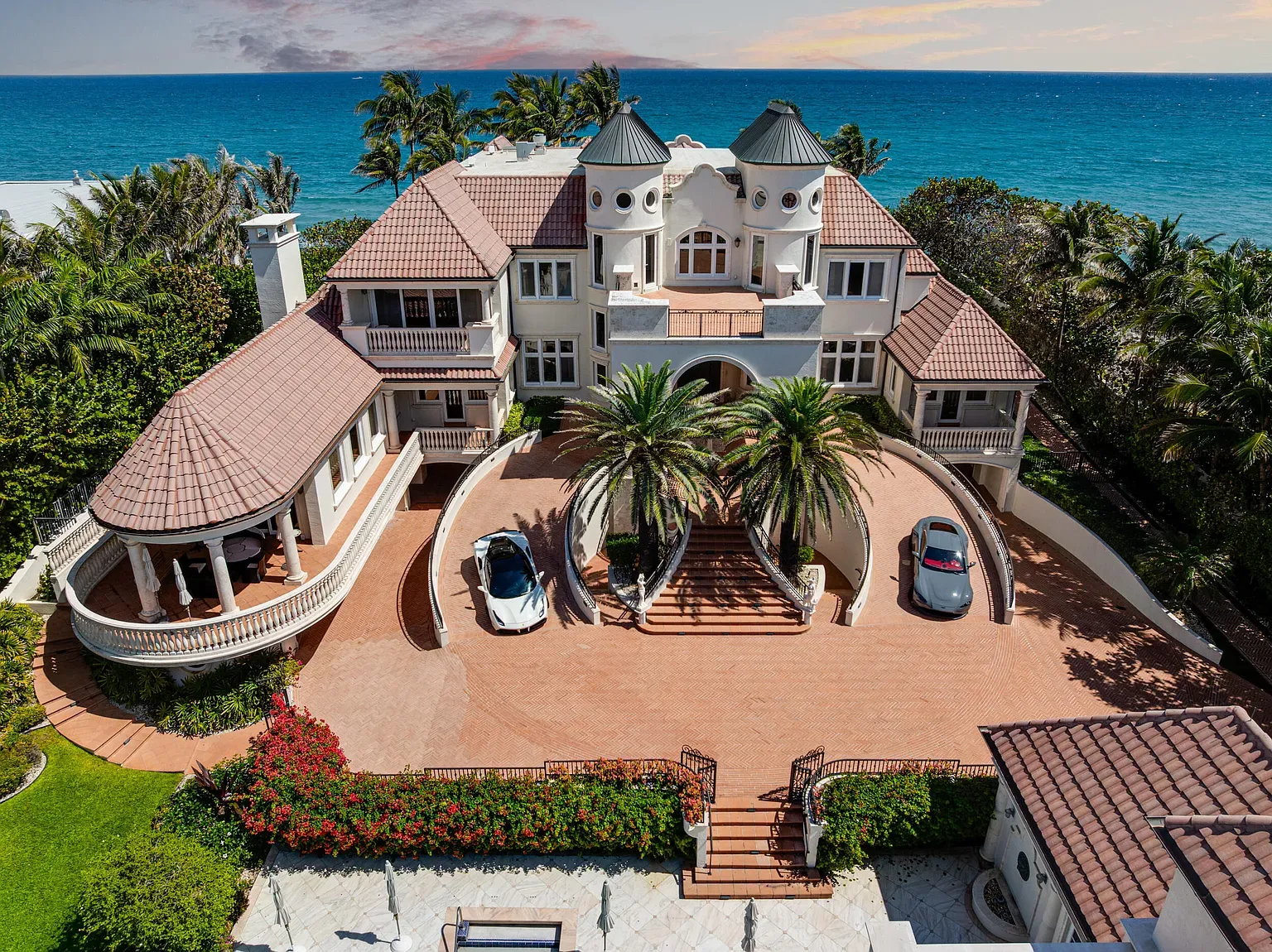 Grand entrance alert—beige stucco, terracotta towers, a little theme-park-y?