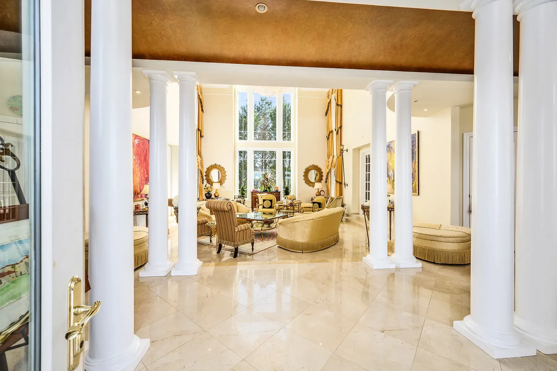 Living area opens up huge. marble floors reflecting everything. Too echoey?