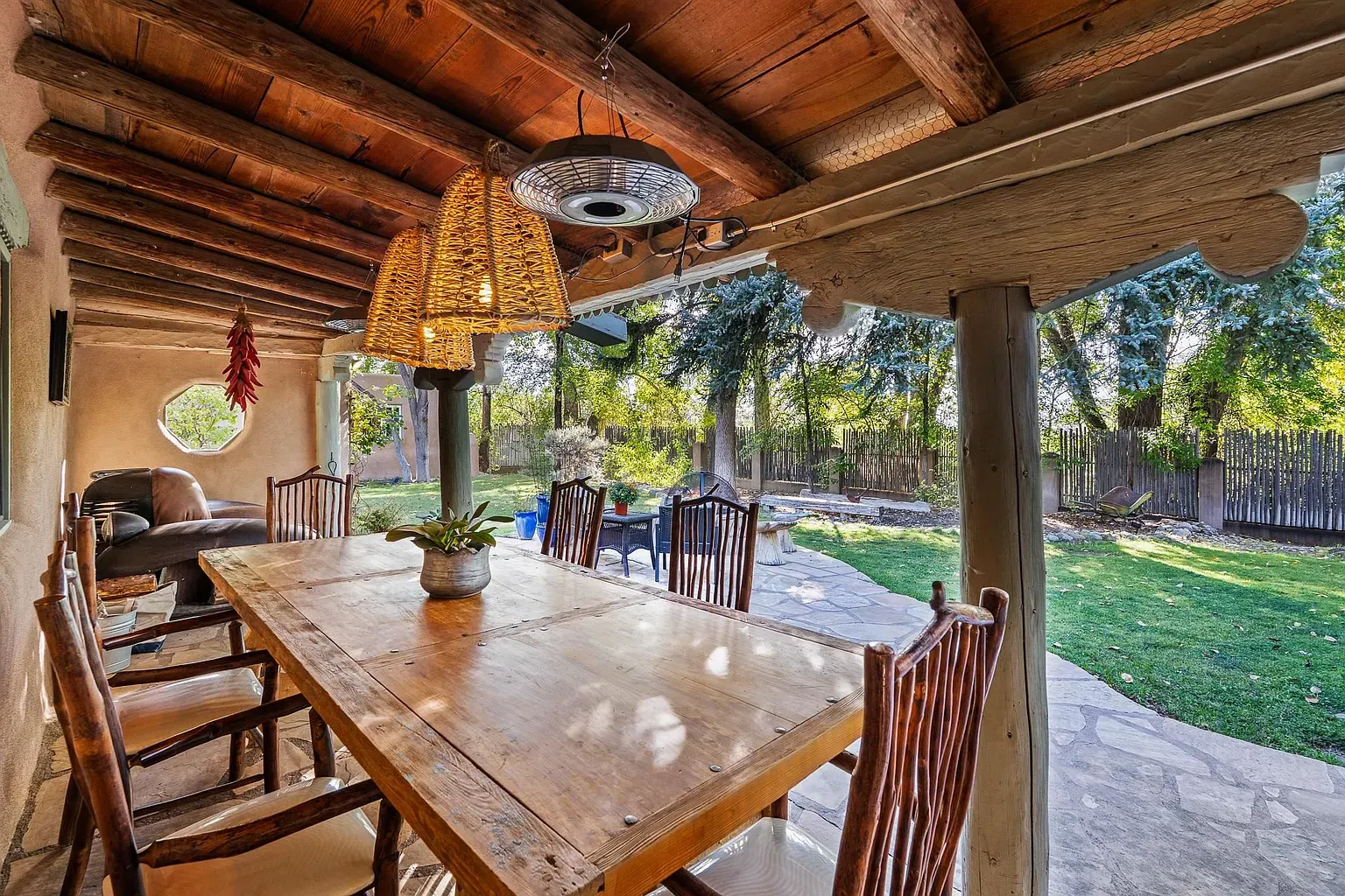 Shaded dining under big timbers. Plate-to-sunset distance. minimal.
