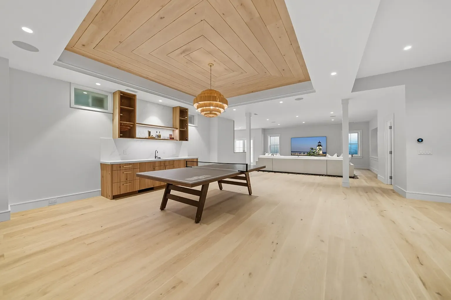 And then this coffered wood ceiling steals the show. Rest stays quiet.