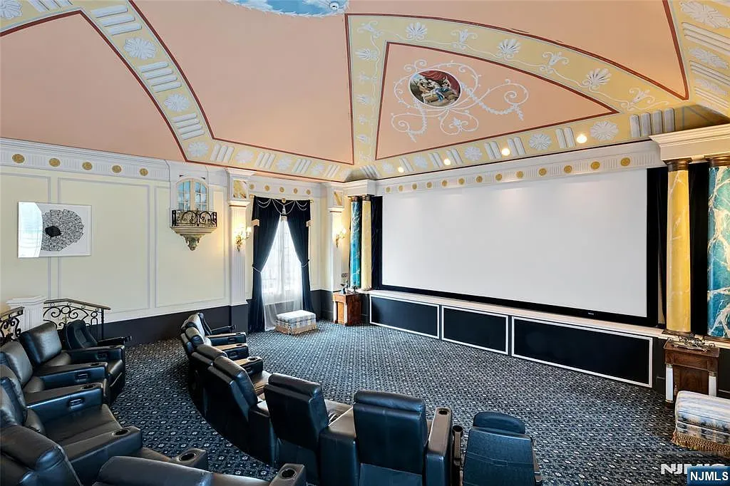 Home theater with gilded ceiling medallion. From this angle, the ceiling steals it.