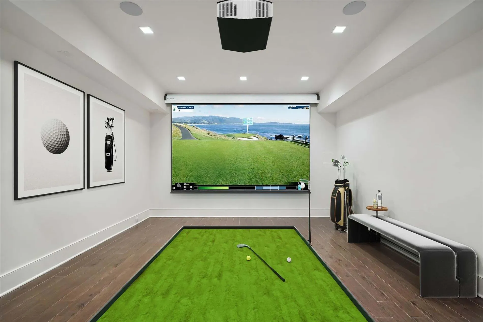 Here’s the golf cave—greens and whites. Do you actually hit real balls?