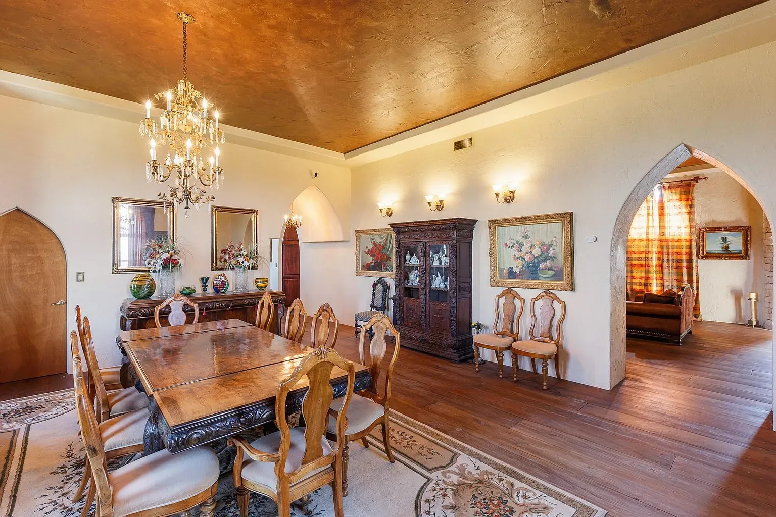 Big carved table situation. Looks every dinner would be a ceremony.