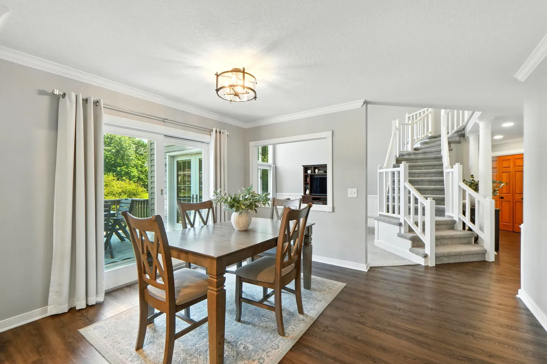 Breakfast nook energy — simple table, nice light. Could be cozier with a rug?