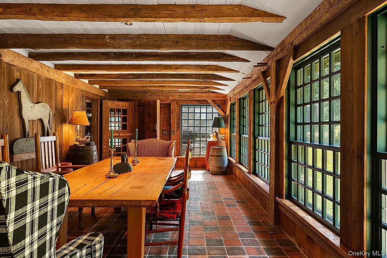 Lots of paneling, lots of beams. Cozy, but maybe a touch cave-y?