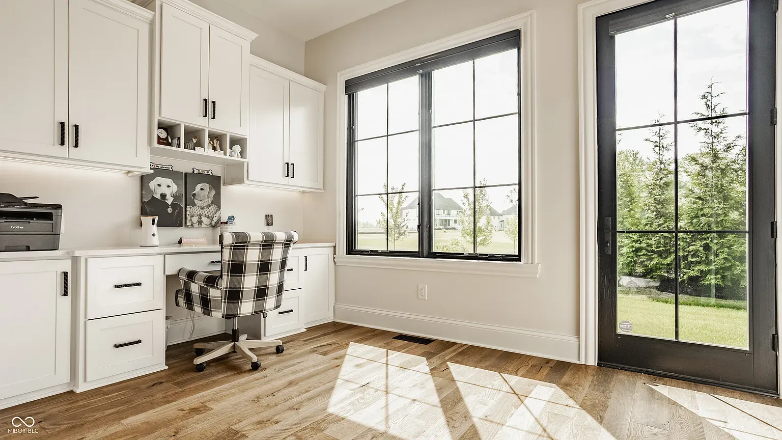 If I had this office, emails would feel dramatic with those black-framed windows.