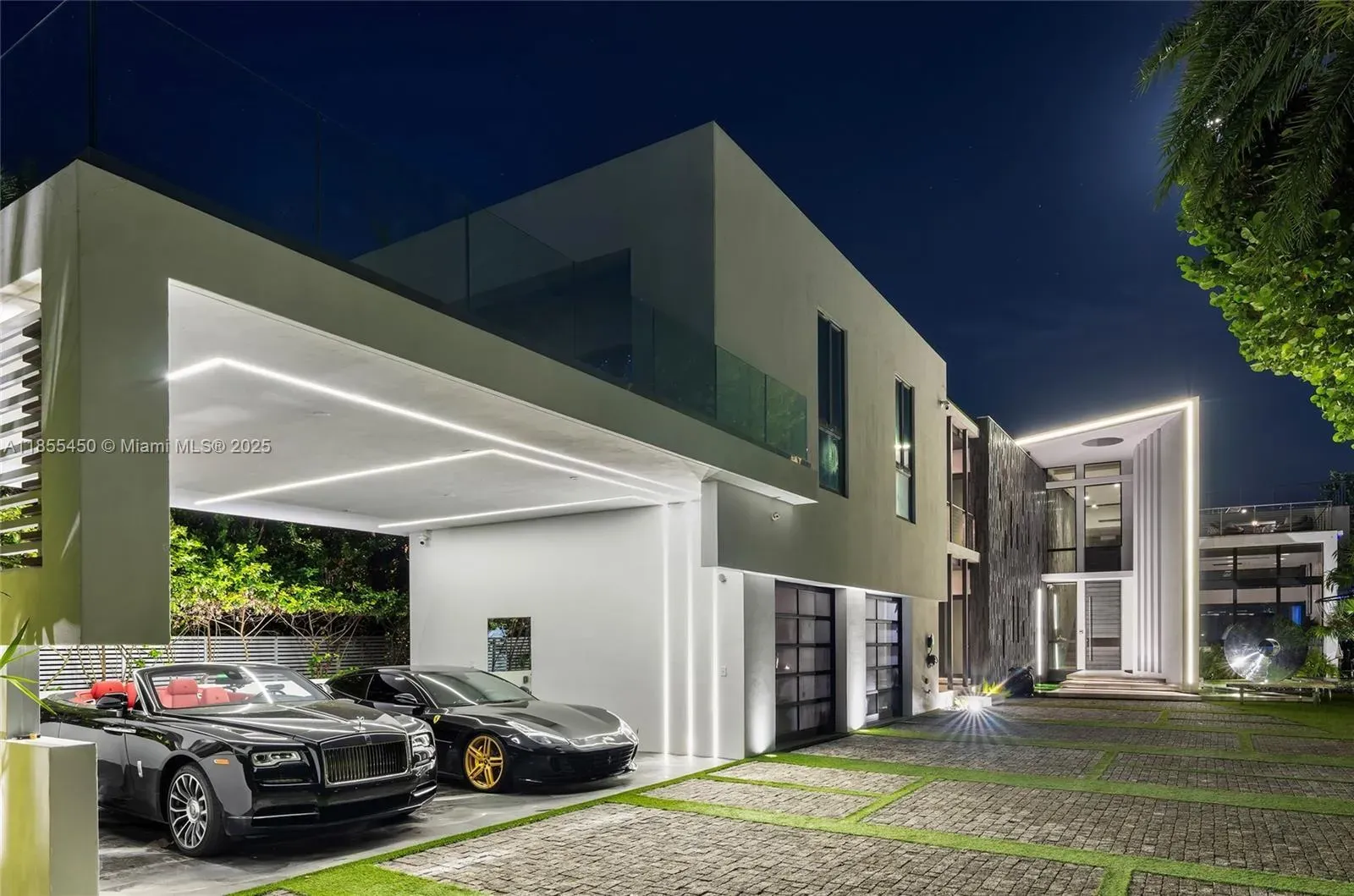 Night facade. crisp white with warm wood. Simple, expensive, kinda perfect.