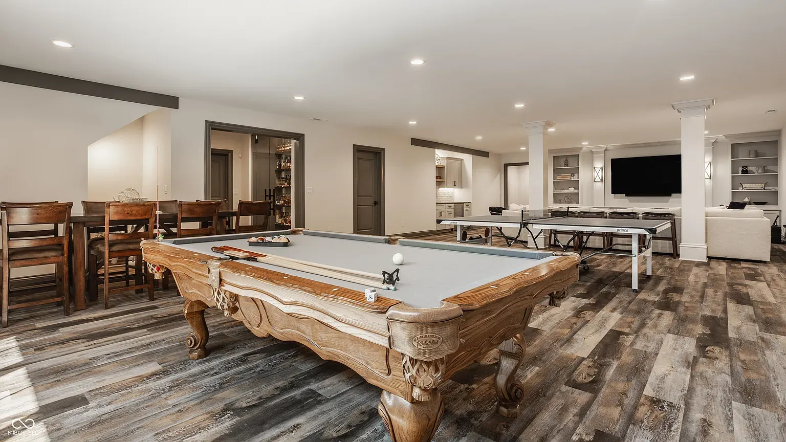 Antique pool table steals the scene. Floor pattern is surprisingly cool.