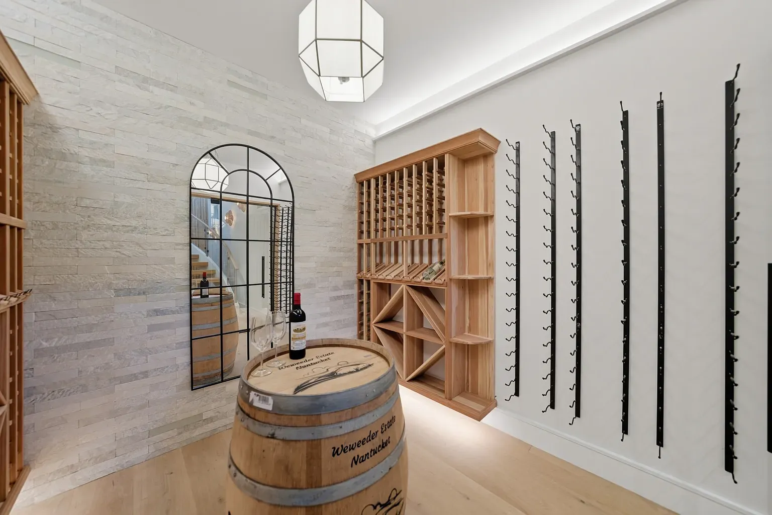 Wine room flex. Light stone everywhere, mirror going full jewelry.