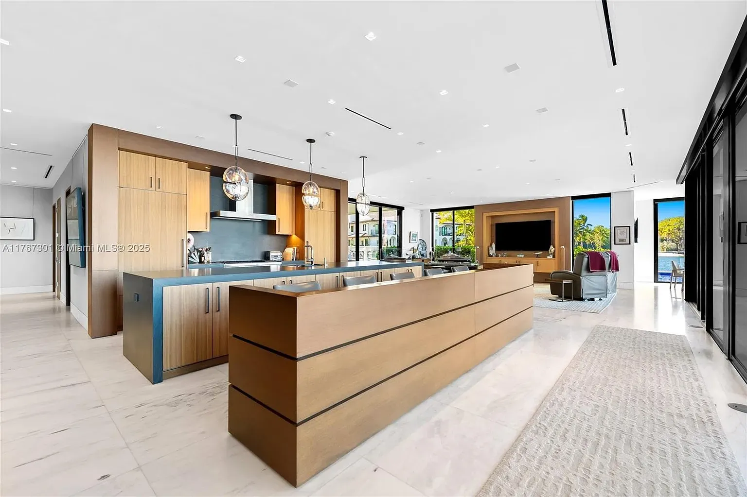 That kitchen island is a slab of honeyed wood. Feels a boat deck.
