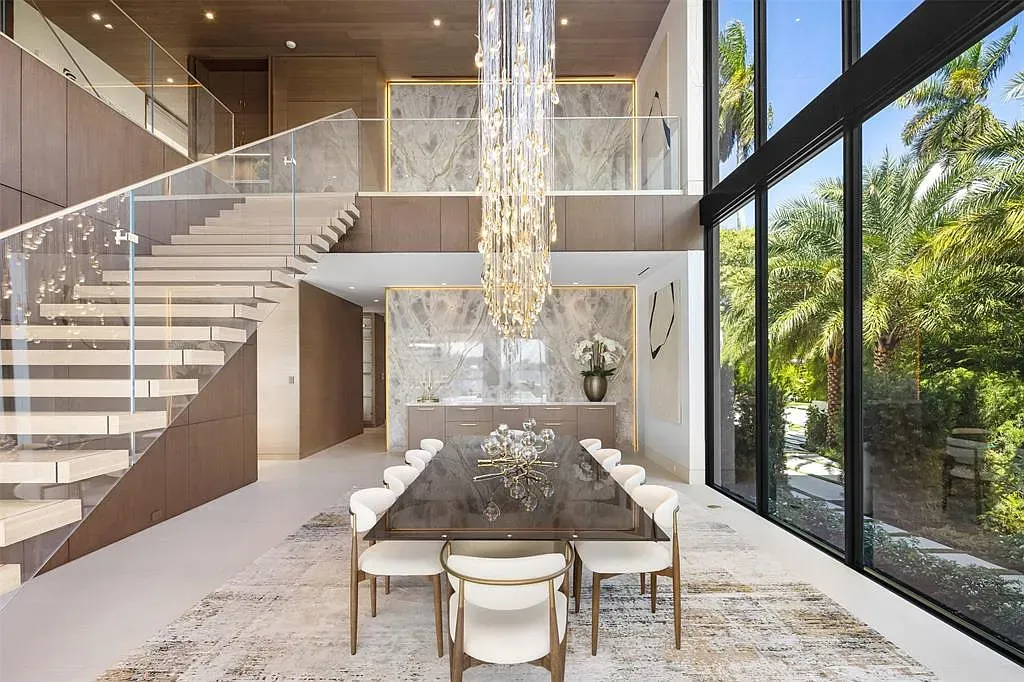 Glass dining table that never ends. Do placemats just skid off?