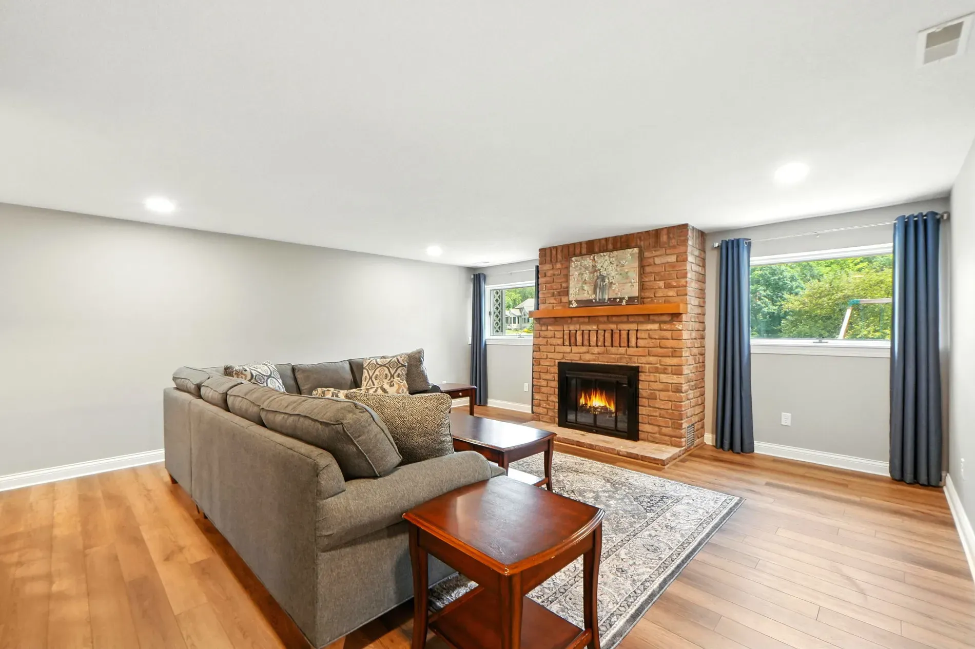 And then, a second fireplace. Brick this time. Cozy, maybe update mantel.