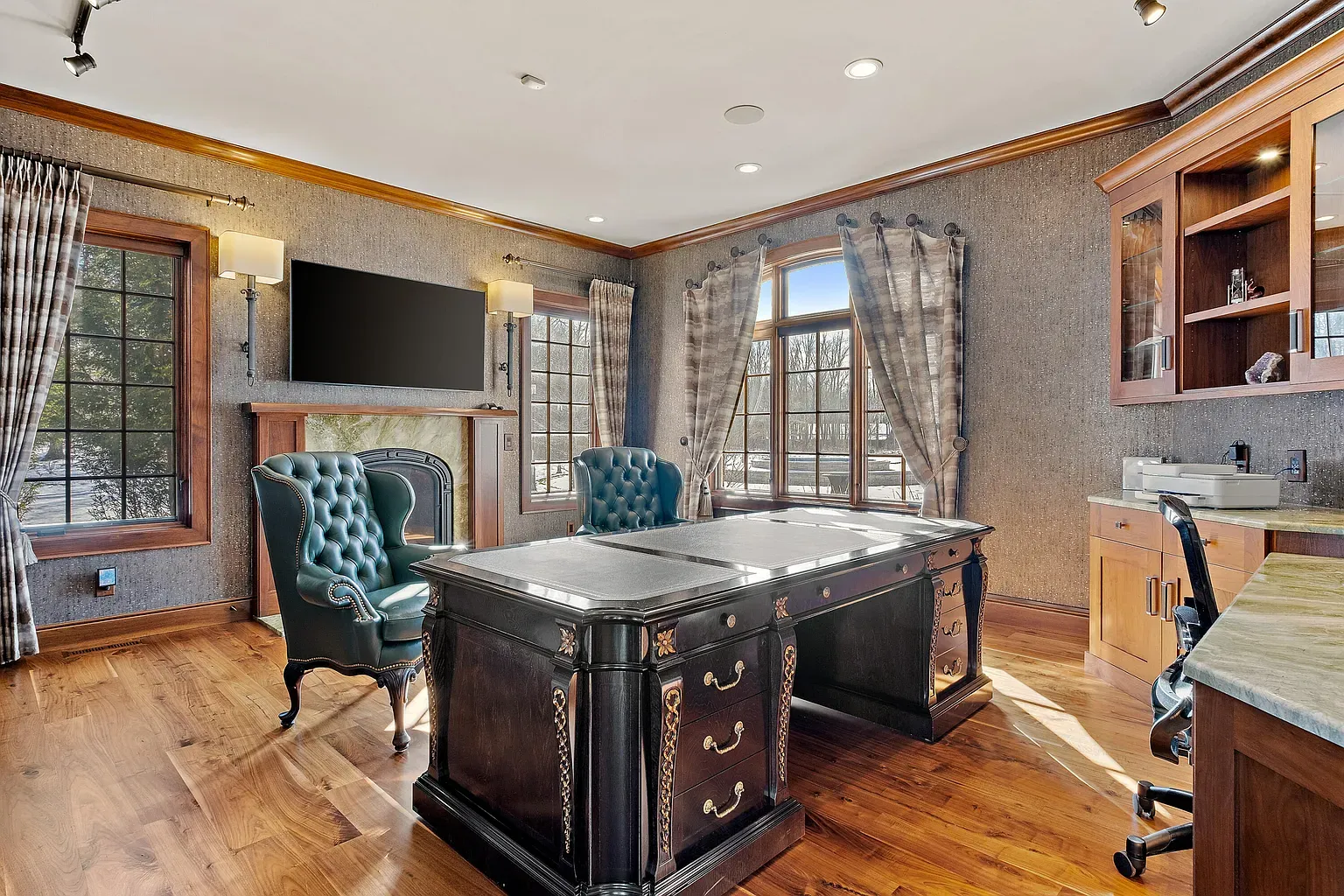 That office desk means business. leather chairs look they make decisions.