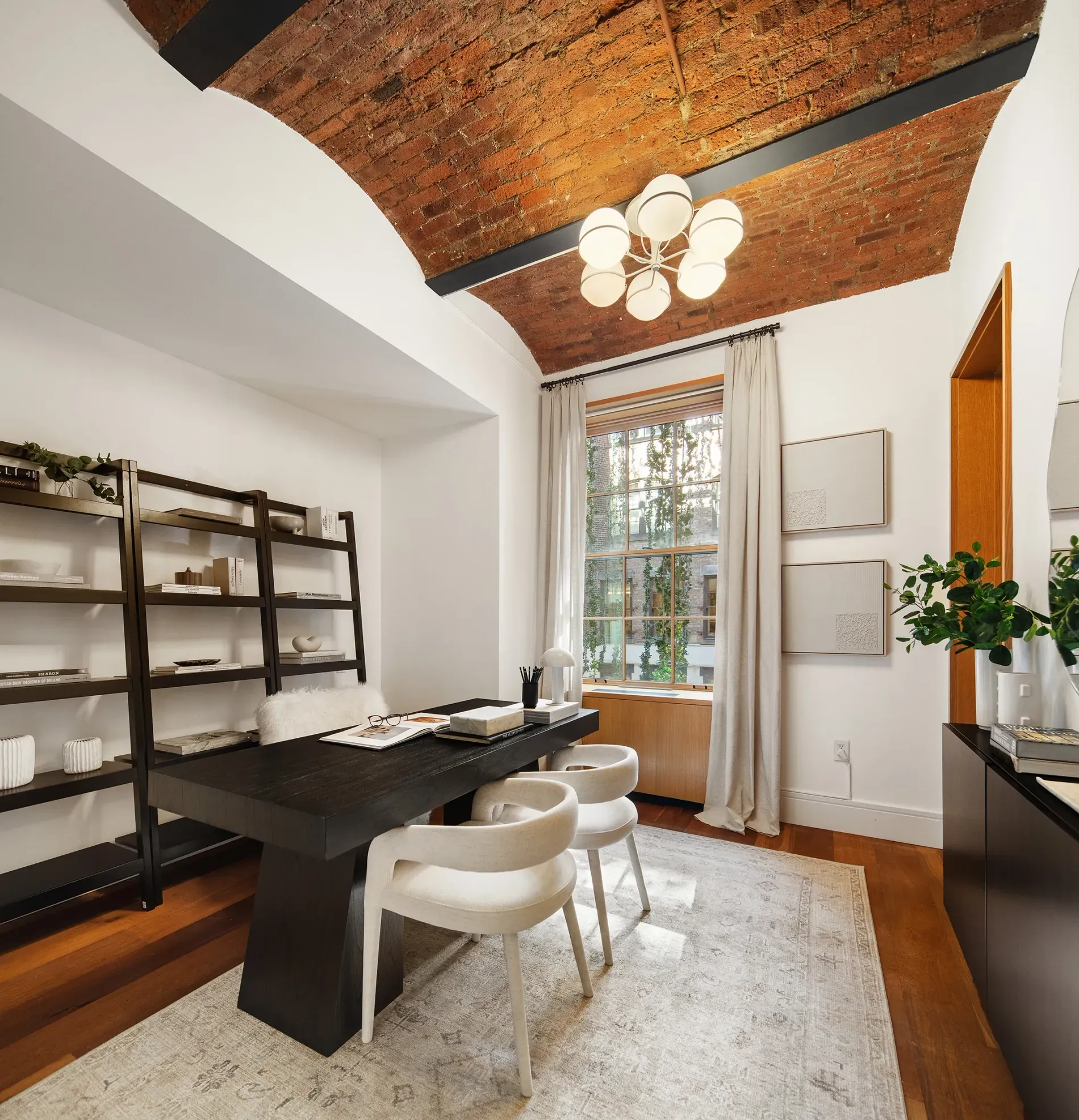 Okay, this workspace—vaulted red brick ceiling. This angle makes it feel taller.