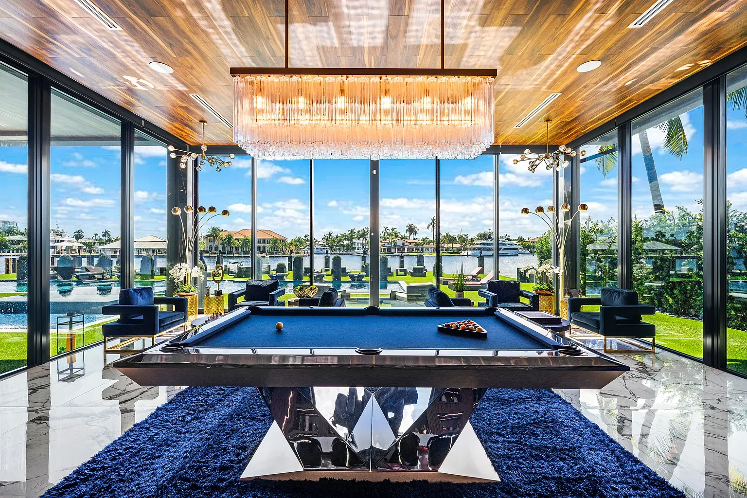 Slick black pool table begging for a game I’ll definitely lose.